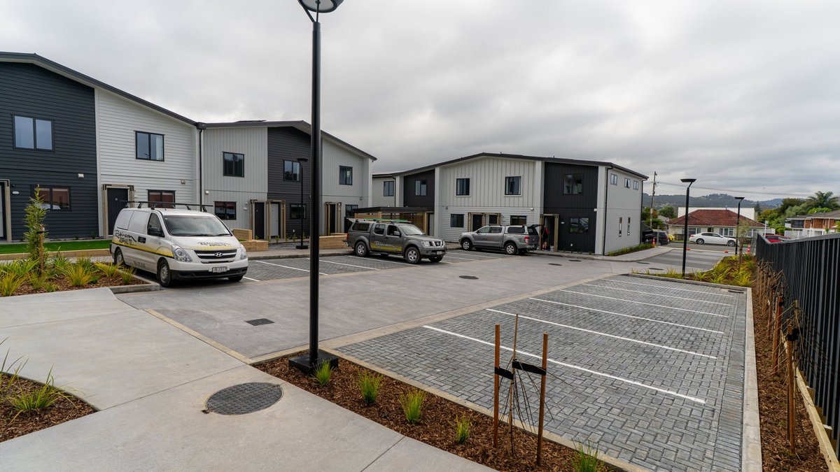 Habitat for Humanity townhouses at Horahora with new carparks, paving, lighting and planting