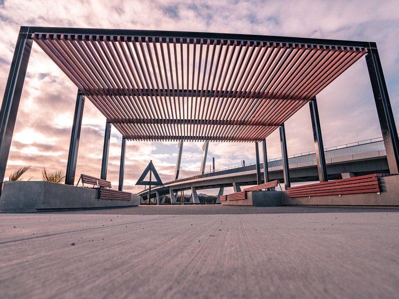 Timber-slat shade structure and seating beside the Hātea River, Whangārei