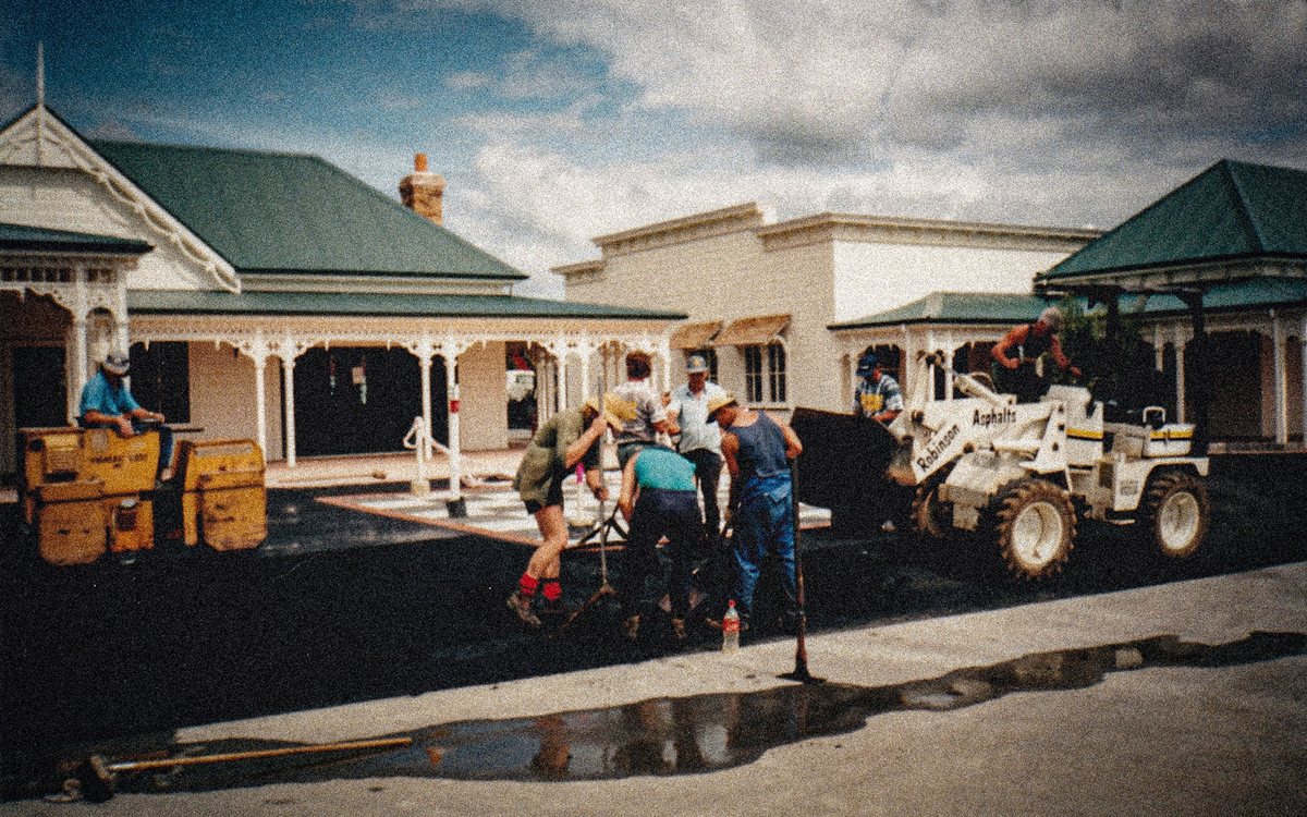 Early Robinsons crew laying hotmix around the outdoor chess board at the Whangārei Town Basin