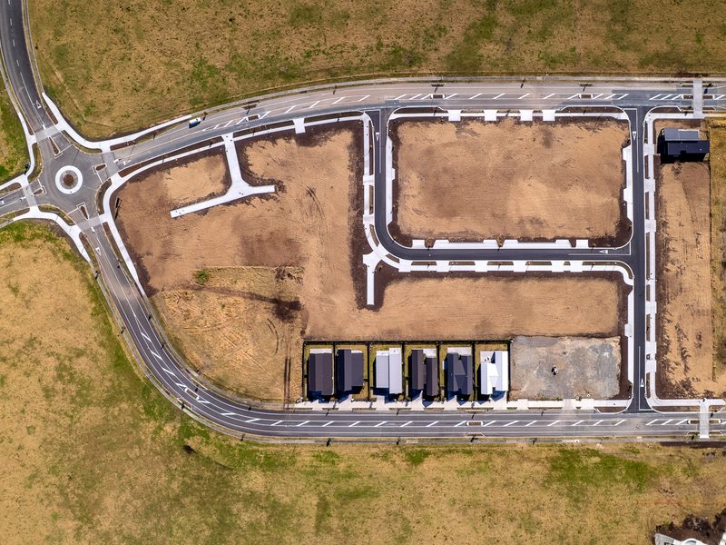 Aerial view of new subdivision roads and lots at Marsden City, Ruakākā