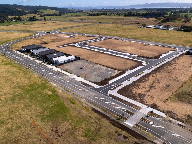 First homes beside new roads and footpaths at Marsden City, Ruakākā