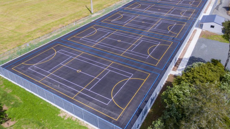 Aerial view of new multi-sport courts with line marking